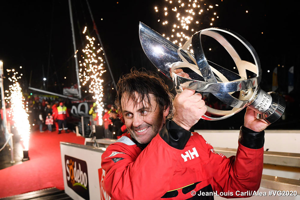 Bestaven hoists the coveted Vendée trophy after redress given made him the overall winner. 